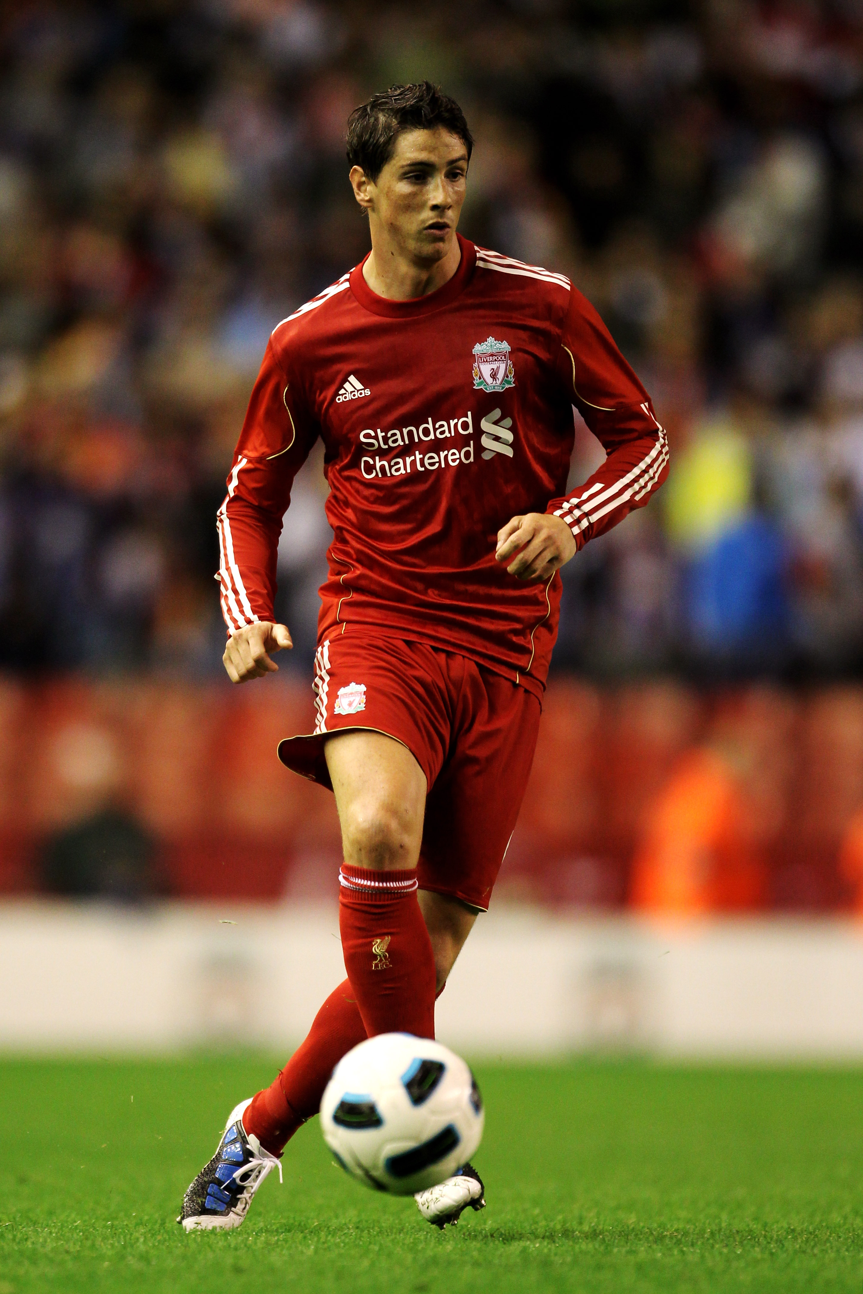 LIVERPOOL, ENGLAND - AUGUST 19: Fernando Torres of Liverpool in action during the UEFA Europa League play-off first leg match beteween Liverpool and Trabzonspor at Anfield on August 19, 2010 in Liverpool, England. (Photo by Alex Livesey/Getty Images)