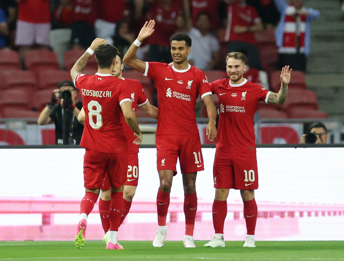 Liverpool’s Cody Gakpo celebrates scoring its first goal against Bayern Munich in a pre-season friendly, with Alexis Mac Allister, Diogo Jota and Dominik Szoboszlai.